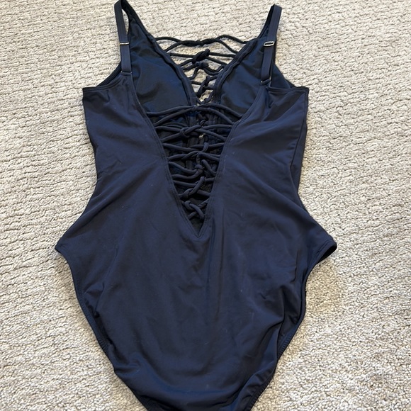Ladies, black one piece, crisscross front and back. Gold adjustable brackets. - Picture 3 of 3
